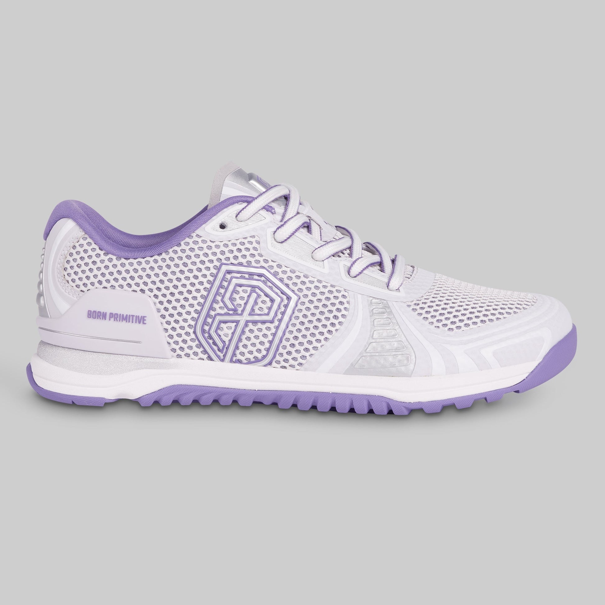 White athletic shoe with purple accents on a gray background