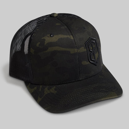 Camouflage trucker hat with a logo on a gray background