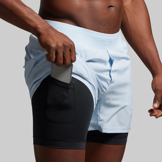 Close-up of athletic shorts with a plain background