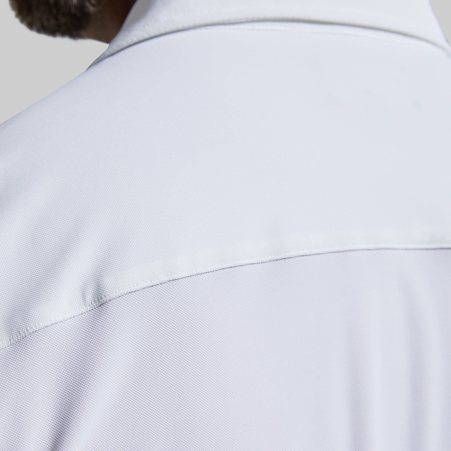 Close-up of a white shirt with a collar