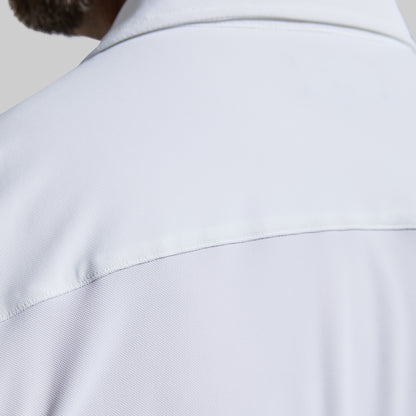 Close-up of a white shirt with a collar