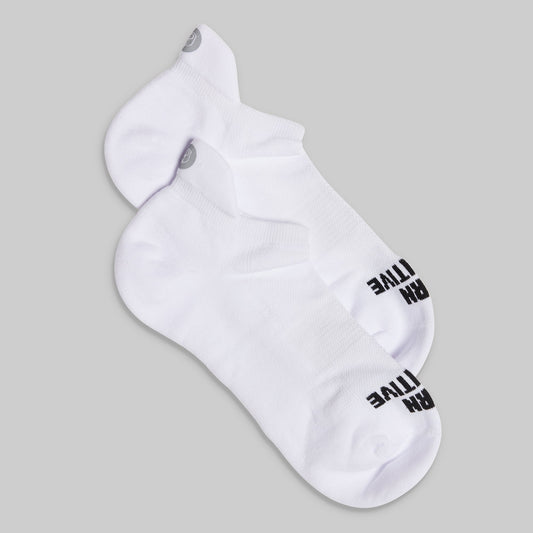 White ankle sock with black text on a gray background
